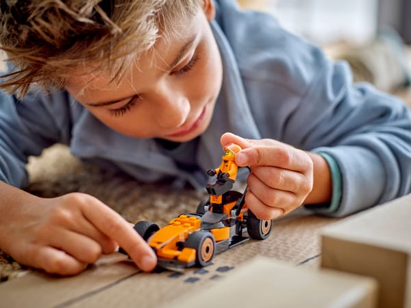 F1 Driver with McLaren Race Car — 7